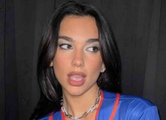 Dua Lipa Rocks Baseball Jersey and Fishnet Tights Outfit news-15112024-171210
