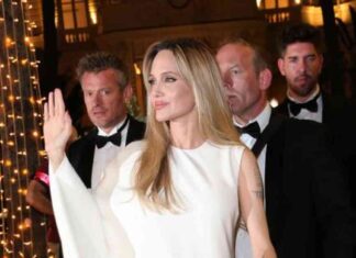angelina-jolie-stuns-in-white-caped-asymmetrical-gown-at-cannes